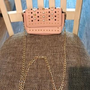 Purse, pink with white pearls. Gold tone strap. Steve Madden.